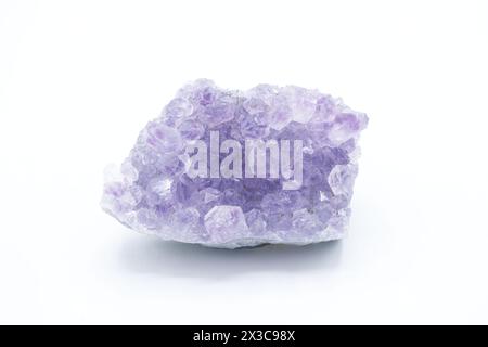 Natural gem purple amethyst isolated on white background. Crystal Stone macro mineral, purple rough amethyst quartz crystals on white background Stock Photo
