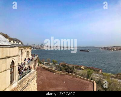 Istanbul, Turkey - April 1, 2024: people enjoy the view from Topkapi palace to the Bosporus. Stock Photo