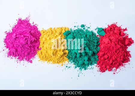 Pile of multicolored holi powder isolated on white background. Top view. Stock Photo