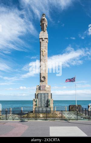World War Monument on Douglas seafront, Isle of Man, with a statue of a soldier on top of a tall column, Stock Photo