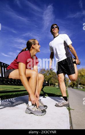 Runners stretching and getting ready to run at the park in Utah. Stock Photo