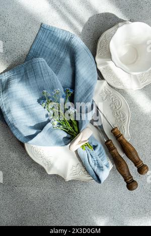 Spring table setting with flowers Stock Photo