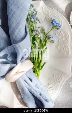 Spring table setting with flowers Stock Photo