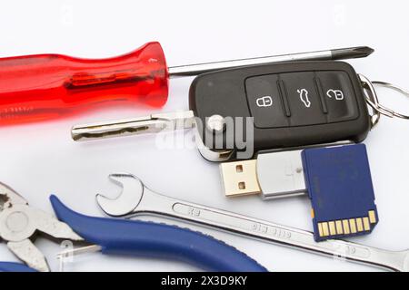 car key, tools and memory card, symbolic image for the emissions scandal, Dieselgate Stock Photo