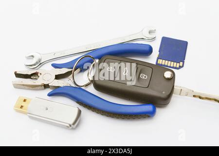 car key, tools and memory card, symbolic image for the emissions scandal, Dieselgate Stock Photo