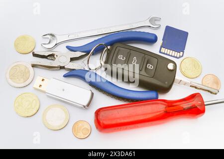 car key, tools and memory card, symbolic image for the emissions scandal, Dieselgate Stock Photo