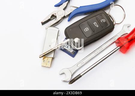 car key, tools and memory card, symbolic image for the emissions scandal, Dieselgate Stock Photo
