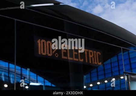 Electric bus sighboard close up. Inscription 100 percent electric Stock Photo