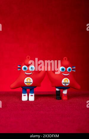 ZHONGSHAN China-April 22 2024: 2024 Paris Olympic Games and Paralympic Games mascots the Phryges at vertical composition. Stock Photo