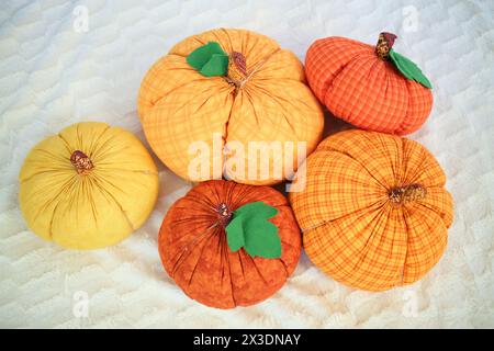 Five textile orange pumpkins Stock Photo
