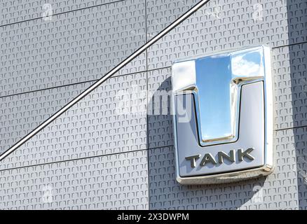 Samara, Russia - April 16, 2024: Car showroom of a brand Tank. Official dealership sign of Tank on the wall of the office building. Chinese automobile Stock Photo