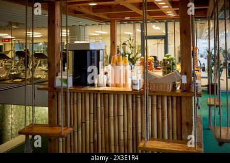 MOSCOW, RUSSIA - SEP 30, 2017: Bar counter with coffee machine, paper cups, fruits in recreation zone of Headquarters Mail.Ru Group. Stock Photo