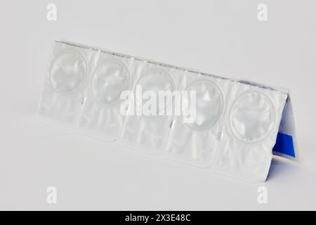 Package of contact lenses on white background. Stock Photo