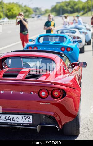 MOSCOW, RUSSIA - MAY 27, 2018: Several Lotus cars stand on curb of highway. Stock Photo