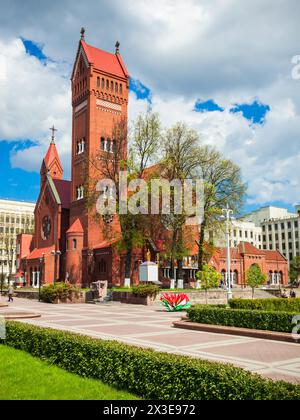 Church of Saints Simon and Helena or the Red Church is a Roman Catholic church on Independence Square in Minsk, Belarus Stock Photo