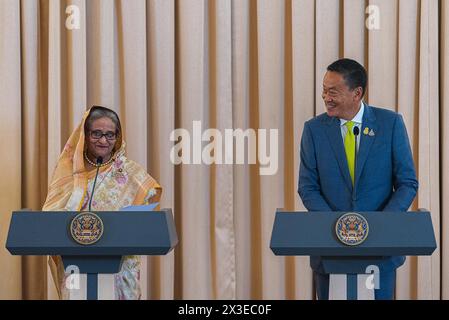Bangkok, Thailand. 26th Apr, 2024. Bangladesh's prime minister Sheikh Hasina (L) and Thailand's Prime Minister Srettha Thavisin (R) speak to the media during a press conference at Government House. Bangladesh's prime minister Sheikh Hasina is on a six-day official visit to Thailand that aim to strengthen ties between the two nations. Sheikh Hasina is the first prime minister of Bangladesh who official visit Thailand since 2002. Credit: SOPA Images Limited/Alamy Live News Stock Photo
