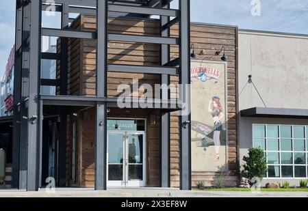 Houston, Texas USA 04-07-2024: Bombshells restaurant bar storefront exterior business company. Stock Photo