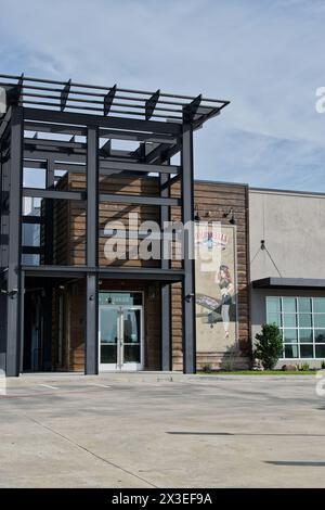 Houston, Texas USA 04-07-2024: Bombshells restaurant bar storefront exterior business company. Stock Photo