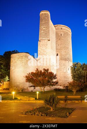 The Maiden Tower at night. It is also known as Giz Galasi and located in the Old City in Baku, Azerbaijan. Stock Photo