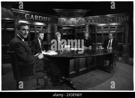 DAVID DIMBLEBY, QUESTION TIME, 1994: Presenter David Dimbleby prepares for the recording of Question Time at Culverhouse Cross ITV Studios in  Cardiff, Wales on 17 March 1994. The panel for the show was: John Redwood, Kim Howells, Ieuan Wyn Jones and  Liz Symons. INFO: Question Time, a BBC current affairs television program, provides a platform for political debate and discussion. Broadcast since 1979, it features a panel of politicians, journalists, and public figures who engage in lively exchanges on topical issues facing the nation. Stock Photo