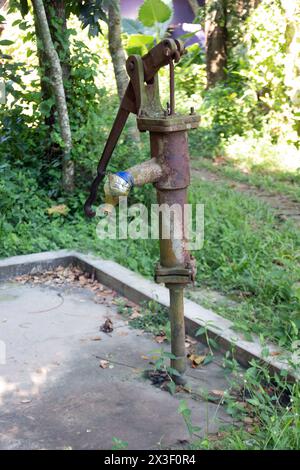 a tube well in a village in Bangladesh. fresh water in house. image for world water day concept. Stock Photo