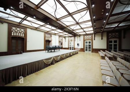 MOSCOW - SEP 16, 2017: Concert hall with grand piano on stage in Big Tsaritsyno Palace Stock Photo