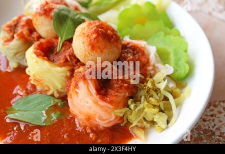 Khanom Jeen Nam Ya Pa, Thai North-eastern Region Dish of Rice Vermicelli with Hot and Spicy Minced Fish Soup Stock Photo