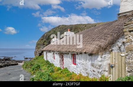 Old cottage at Niarbyl Beach, Isle of Man, England, UK Stock Photo