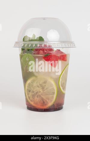 Refreshing summer drink. Colored lemonades,mojito, strawberry in plastic cups with ice. Take away drinks. Stock Photo