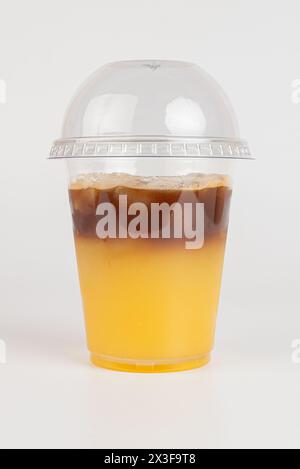 Refreshing summer drink. Colored lemonades,mojito, strawberry in plastic cups with ice. Take away drinks. Stock Photo