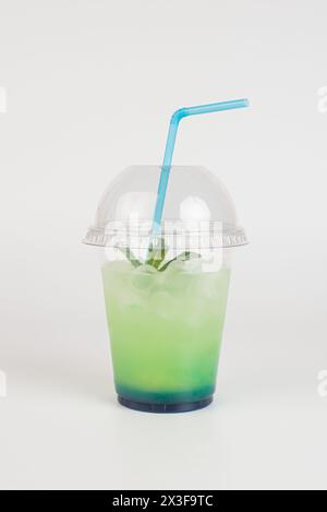 Refreshing summer drink. Colored lemonades,mojito, strawberry in plastic cups with ice. Take away drinks. Stock Photo