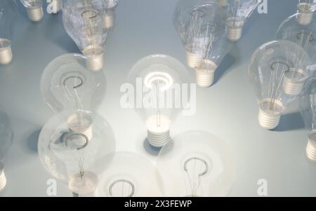 Several light bulbs are placed on top of a table, creating a bright and illuminated scene. The bulbs vary in size and shape, adding visual interest to Stock Photo