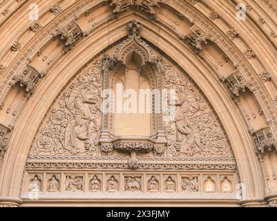 Bristol, England- March 29, 2024: Carved stone details of the entrance of Bristol Cathedral Stock Photo
