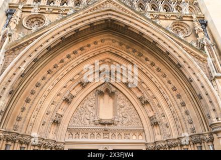 Bristol, England- March 29, 2024: Carved stone details of the entrance of Bristol Cathedral Stock Photo