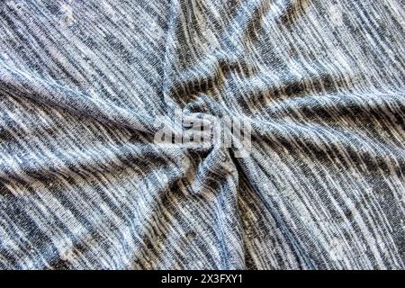 White black cage cotton gentle texture clothes. Cage textile cloth background in sun summer day for fashion clothing. Stock Photo