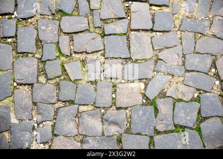 Grey brick wall background. Gray stone block surface with horizontal texture of gray brick. Stock Photo