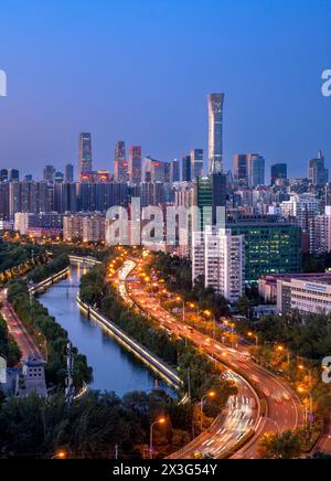 The night CBD of Guomao cityscape with traffic flow in Beijing, China Stock Photo