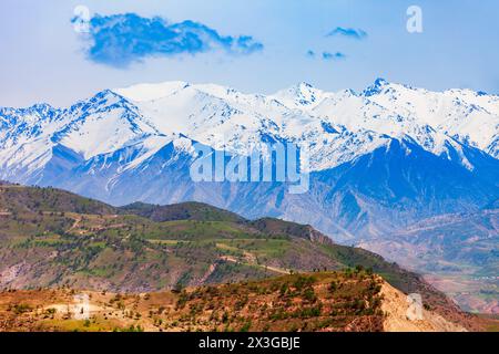 Pamir Mountains, view from the Hisorak water reservoir near Shahrisabz city in Uzbekistan Stock Photo