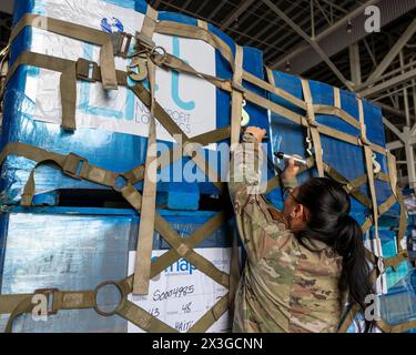 Homestead, United States. 26th Apr, 2024. U.S. Air Force loadmasters secure pallets of humanitarian aid and medical supplies for Haiti before loading into the cargo bay of a Air Force C-130J Super Hercules aircraft at Homestead Air Reserve Base, April 26, 2024, in Homestead, Florida. The emergency supplies provided by NGO's were delivered to Port-au-Prince. Credit: TSgt. Lionel Castellano/US Airforce Photo/Alamy Live News Stock Photo