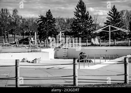 drained and empty public pool for winterization in the fall. Stock Photo