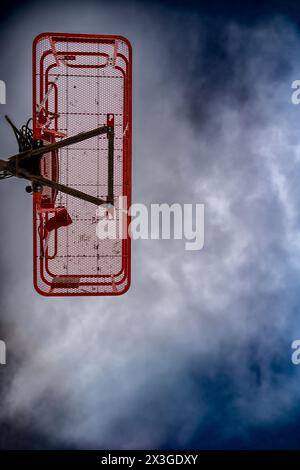 directly underneath a caged aerial work platform lift. Stock Photo