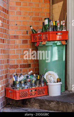 QUEDLINBURG, GERMANY - September 6, 2023: Collected from empty used glass bottles and broken dishware in the catering industry. Stock Photo