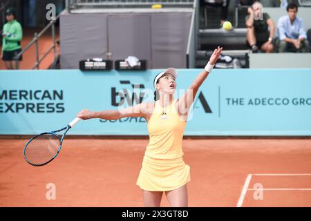 Madrid, Spain. 26th Apr, 2024. Wang Xinyu serves during Women's Singles 2nd round match between Wang Xinyu of China and Caroline Garcia of France at the Madrid Open tennis tournament in Madrid, Spain, April 26, 2024. Credit: Gustavo Valiente/Xinhua/Alamy Live News Stock Photo