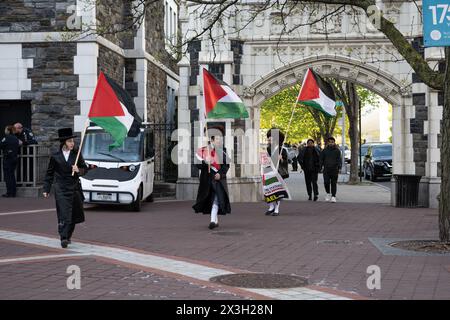 Ultra Orthodox Jewish men at the City College of New York pro Palestine encampment showing their support for the protestors and Palestine. Stock Photo