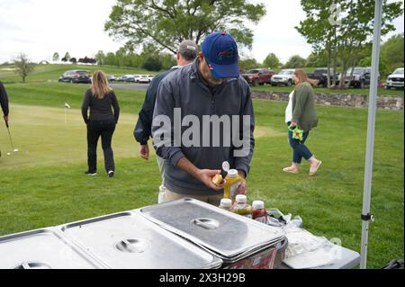 USA; 04-26-2024: Golfers compete in the Apple Blossom HoneyWay Golf Classic presented by Bank of Clarke. The tournament was held at the Rock Harbor Go Stock Photo