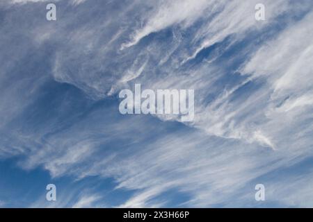Wispy cirrus clouds clouds in a blue sky. Japan. Stock Photo