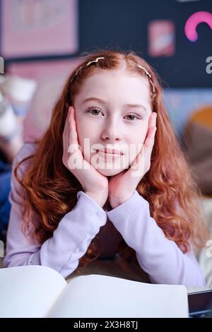 Portrait of girl with curly red hair and freckles Stock Photo - Alamy