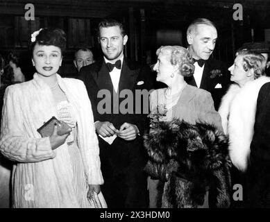 GOOGIE WITHERS JOHN McCALLUM and Mrs. WITHERS (mother of Googie) at the premiere at The New Gallery cinema, Regent Street, London in June 1947 of GOOGIE WITHERS JEAN KENT and JOHN McCALLUM in THE LOVES OF JOANNA GODDEN 1947 directors CHARLES FREND and (uncredited) ROBERT HAMER novel Sheila Kaye-Smith screenplay H.E. Bates music Ralph Vaughan Williams producer Michael Balcon Ealing Studios / General Film Distributors (GFD) Stock Photo