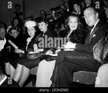 PATRICIA ROC and RONALD NEAME (at right) at the premiere at The New Gallery cinema, Regent Street, London in June 1947 of GOOGIE WITHERS JEAN KENT and JOHN McCALLUM in THE LOVES OF JOANNA GODDEN 1947 directors CHARLES FREND and (uncredited) ROBERT HAMER novel Sheila Kaye-Smith screenplay H.E. Bates music Ralph Vaughan Williams producer Michael Balcon Ealing Studios / General Film Distributors (GFD) Stock Photo