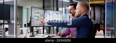 Business analyst working in office analyzing data using KPIs Stock Photo